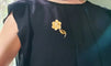 Broche Broche fleur rétro en or jaune 18 carats et perles 58 Facettes 570