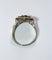 Bague 56 Bague Art déco hexagonale en or blanc et platine, diamants et saphirs 58 Facettes 156