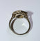 Bague 56 Bague Art déco hexagonale en or blanc et platine, diamants et saphirs 58 Facettes 156
