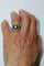 Bague 56 Bague Art déco hexagonale en or blanc et platine, diamants et saphirs 58 Facettes 156