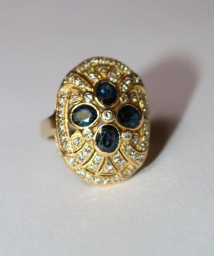 Bague 52 Bague ovale en or jaune 18 carats, saphirs et diamants 58 Facettes 587
