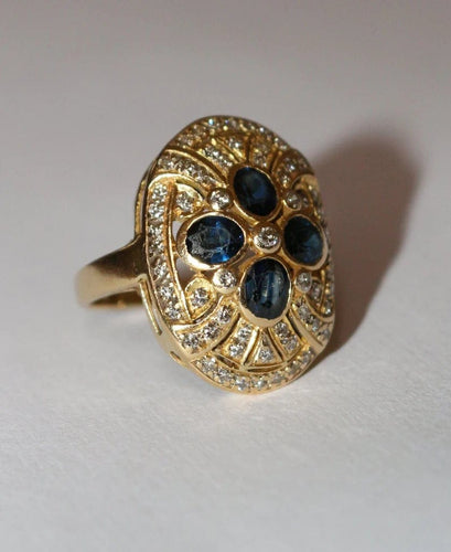 Bague 52 Bague ovale en or jaune 18 carats, saphirs et diamants 58 Facettes 587