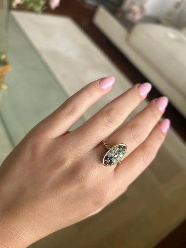 Bague 57 Bague en or jaune 750‰ sertie de diamants, émeraudes, saphirs et rubis 58 Facettes 1034