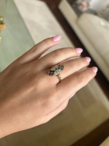 Bague 57 Bague en or jaune 750‰ sertie de diamants, émeraudes, saphirs et rubis 58 Facettes 1034