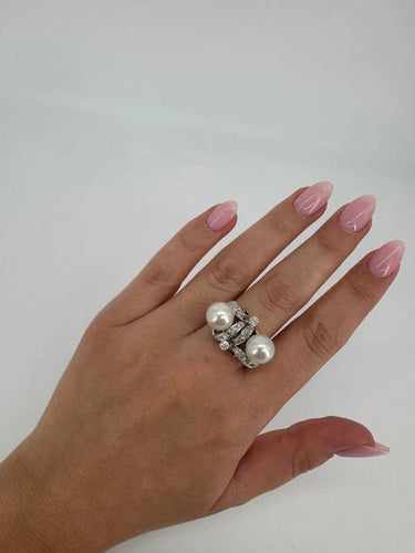 Bague 55 Bague en or blanc 750 sertie de diamants et perles 58 Facettes 1176