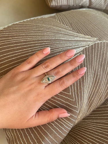 Bague 60 Bague marquise en or blanc 750‰ avec émeraude et diamants 58 Facettes 1020
