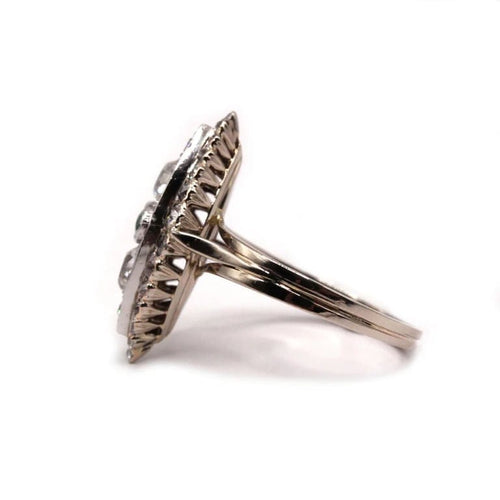 Bague 60 Bague marquise en or blanc 750‰ avec émeraude et diamants 58 Facettes 1020