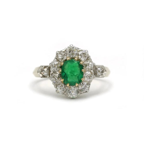 Bague 47 Bague marguerite en or jaune, platine, émeraude et diamants 58 Facettes 1192