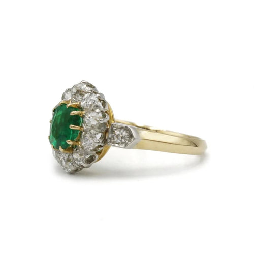 Bague 47 Bague marguerite en or jaune, platine, émeraude et diamants 58 Facettes 1192