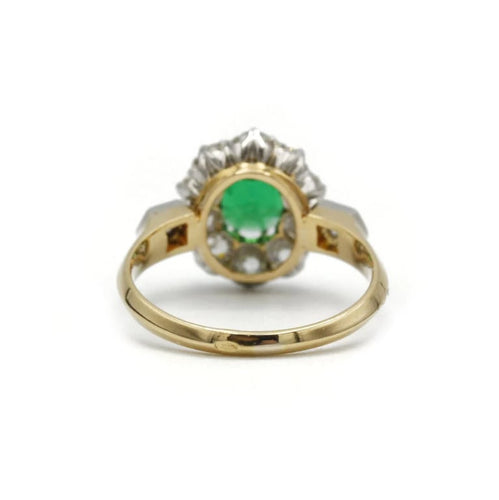 Bague 47 Bague marguerite en or jaune, platine, émeraude et diamants 58 Facettes 1192