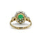 Bague 47 Bague marguerite en or jaune, platine, émeraude et diamants 58 Facettes 1192