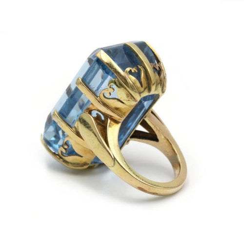 Bague 50 Bague en or jaune 750‰ et topaze bleue 58 Facettes 1072