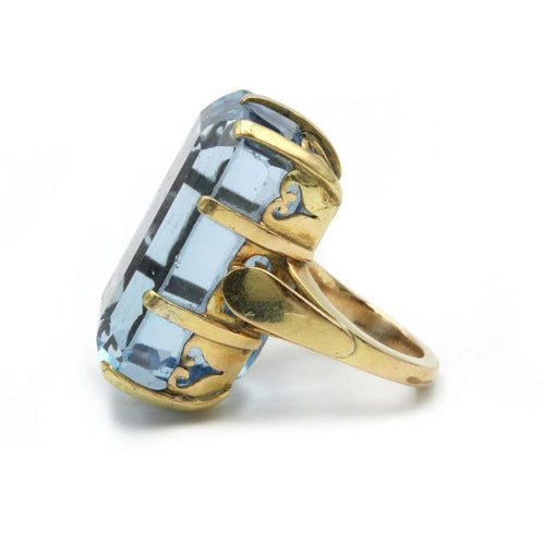 Bague 50 Bague en or jaune 750‰ et topaze bleue 58 Facettes 1072