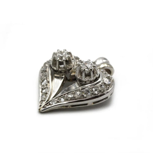Pendentif Pendentif cœur en or blanc et diamants 58 Facettes 1129