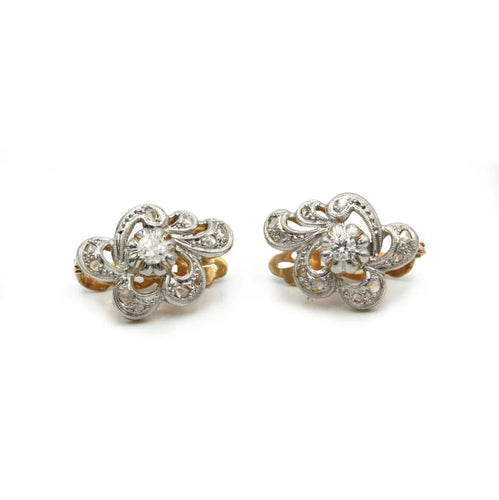 Boucles d'oreilles Boucles d'oreilles motif floral en or jaune et blanc 750 et diamants 58 Facettes 1136