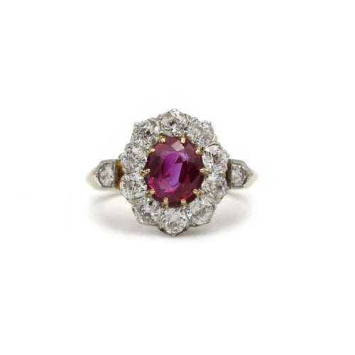 Bague 52 Bague marguerite ancienne en or 750 et platine, rubis birman et diamants 58 Facettes 1322