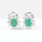 Boucles d'oreilles Boucles d'oreilles halo en or blanc 18 carats, émeraudes et diamants 58 Facettes 125977F