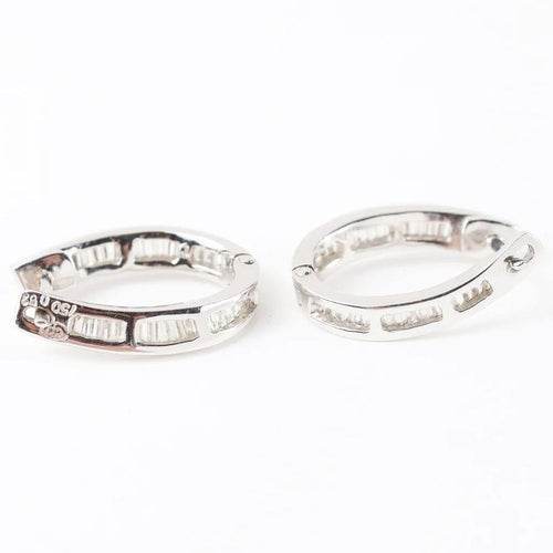 Boucles d'oreilles Boucles d'oreilles créoles en or blanc 18 carats avec diamants 58 Facettes 129460B