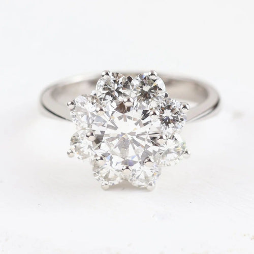 Bague 52 Bague rosette en or blanc 18 carats et diamants 58 Facettes 136043