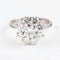 Bague 52 Bague rosette en or blanc 18 carats et diamants 58 Facettes 136043