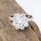Bague 52 Bague rosette en or blanc 18 carats et diamants 58 Facettes 136043