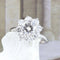 Bague 52 Bague rosette en or blanc 18 carats et diamants 58 Facettes 136043