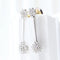 Boucles d'oreilles Boucles d'oreilles longues à rosettes en or blanc 18 carats et diamants 58 Facettes VV1-F