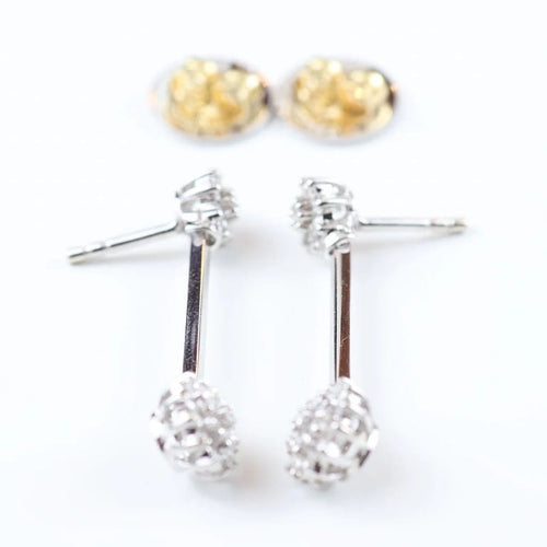 Boucles d'oreilles Boucles d'oreilles longues à rosettes en or blanc 18 carats et diamants 58 Facettes VV1-F