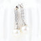 Boucles d'oreilles Boucles d'oreilles en or blanc 18 carats avec diamants et perles 58 Facettes