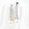 Boucles d'oreilles Boucles d'oreilles en or blanc 18 carats avec diamants et perles 58 Facettes