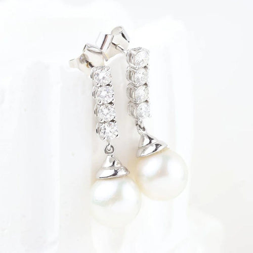 Boucles d'oreilles Boucles d'oreilles en or blanc 18 carats avec diamants et perles 58 Facettes