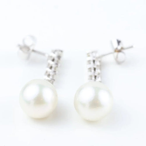 Boucles d'oreilles Boucles d'oreilles en or blanc 18 carats avec diamants et perles 58 Facettes