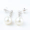 Boucles d'oreilles Boucles d'oreilles en or blanc 18 carats avec diamants et perles 58 Facettes
