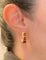 Boucles d'oreilles Pomellato Iconica - Boucles d'oreilles en or rose et grenats 58 Facettes