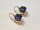 Boucles d'oreilles Pomellato Nudo - Boucles d'oreilles en or blanc et saphirs bleus 58 Facettes