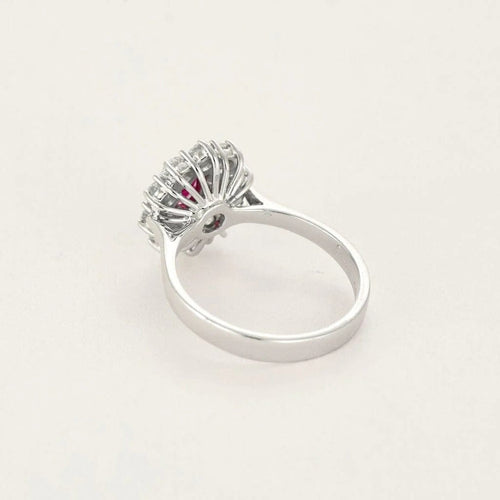 Bague 51.5 Bague marguerite en or gris 18k, rubis ovale et diamants 58 Facettes BA214