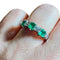 Bague 53 Bague demi-alliance en or blanc 18 carats, émeraudes et diamants 58 Facettes 7822 A