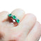 Bague 53 Bague demi-alliance en or blanc 18 carats, émeraudes et diamants 58 Facettes 7822 A