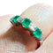 Bague 53 Bague demi-alliance en or blanc 18 carats, émeraudes et diamants 58 Facettes 7822 A