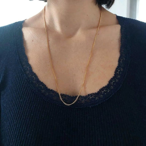Collier Chaîne gourmette longue en or jaune 18k 58 Facettes 229