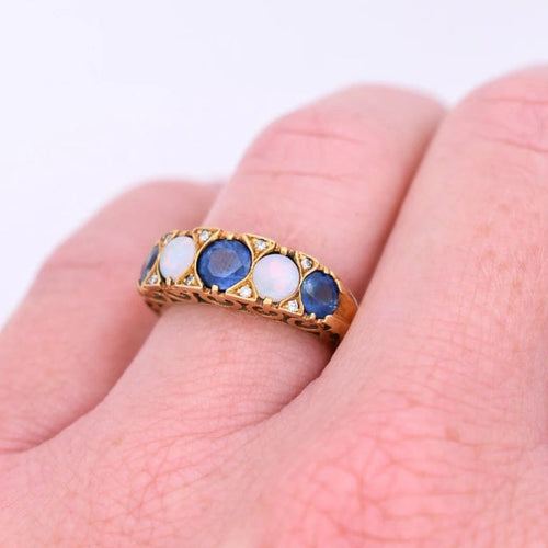 Bague 54 Bague jarretière vintage en or jaune 18 carats, saphirs, opales et diamants 58 Facettes 342