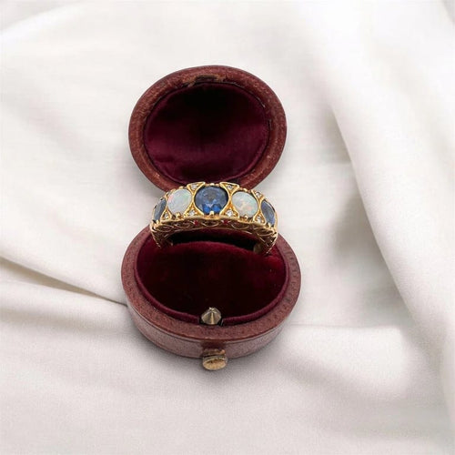 Bague 54 Bague jarretière vintage en or jaune 18 carats, saphirs, opales et diamants 58 Facettes 342