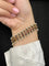 Bracelet Moretti Fiumani Girotondo - Bracelet en or jaune et grenats 58 Facettes