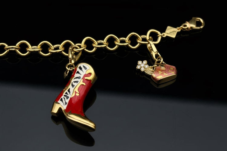 Bracelet Pretty Woman - Bracelet à breloques en or jaune 58 Facettes
