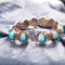 Bracelet Bracelet en or jaune 18 carats aux turquoises 58 Facettes 4180