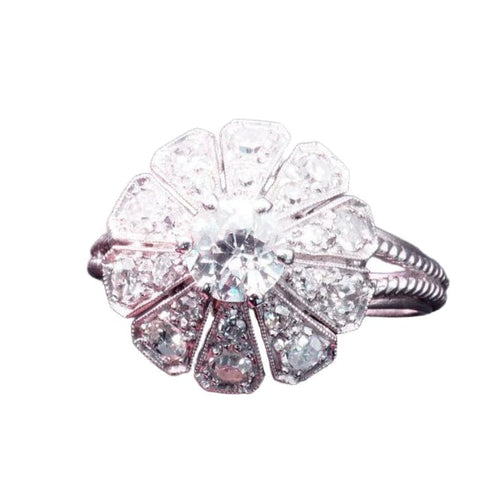 Bague 56 Bague marguerite Art déco en or 18 carats et platine, diamants 58 Facettes 4072