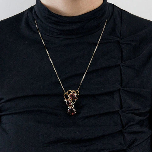Collier Collier - Grenats et diamants en or jaune 750/1000 58 Facettes 35100030
