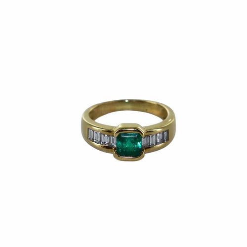 Bague 52 Bague émeraude et diamants en or jaune 58 Facettes