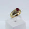 Bague 59 Bague torsadée en or jaune avec rubis et diamants 58 Facettes