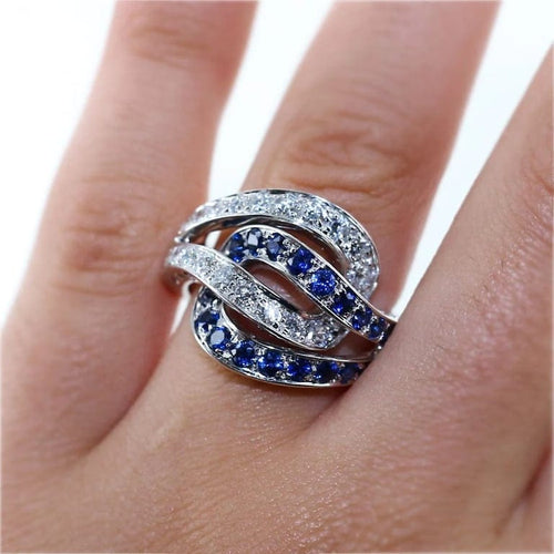 Bague 53 Bague entrelacée en or gris 18 carats, saphirs et diamants 58 Facettes